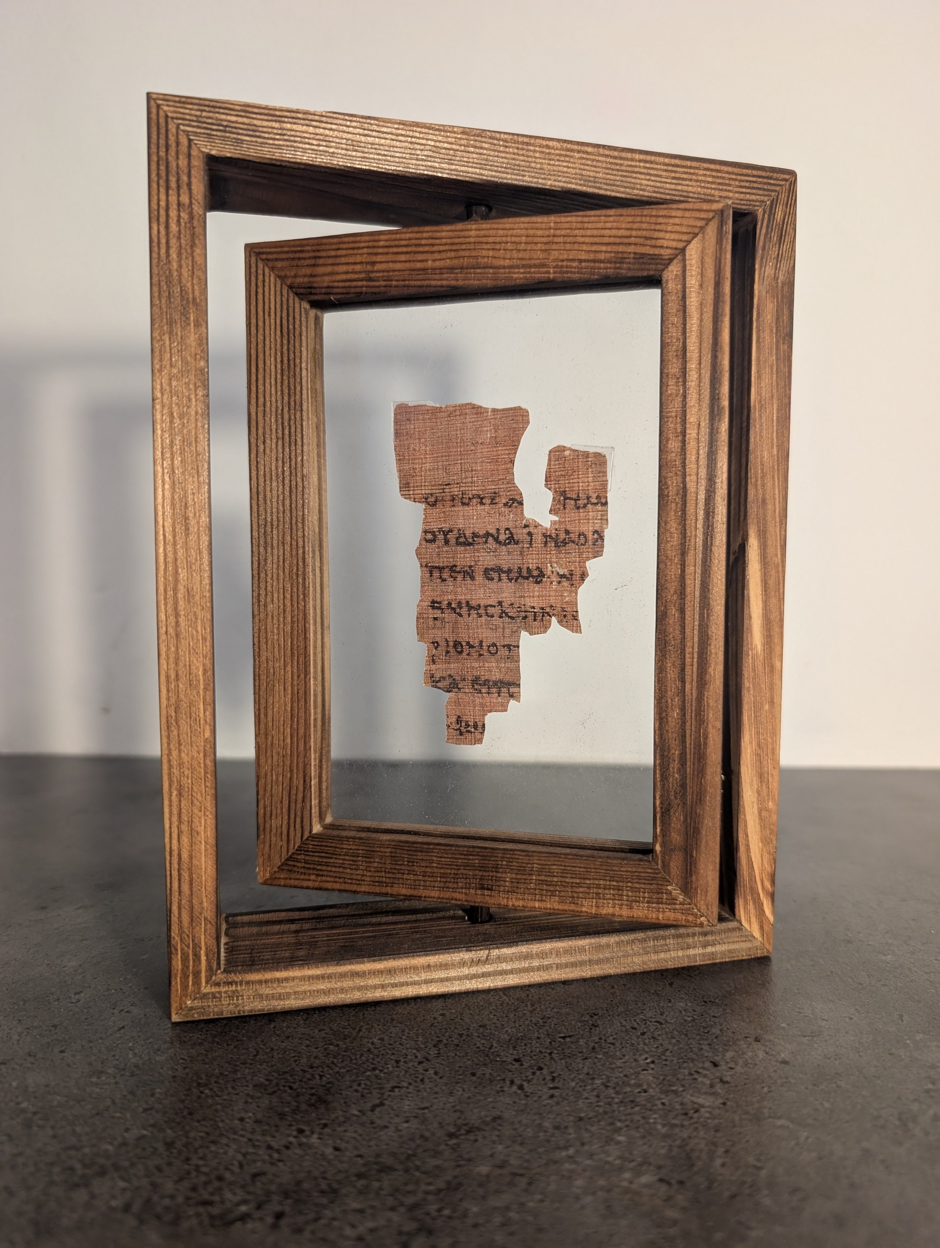 P52 Fragment Replica: Gospel of John 18:31-38. (walnut wood frame)