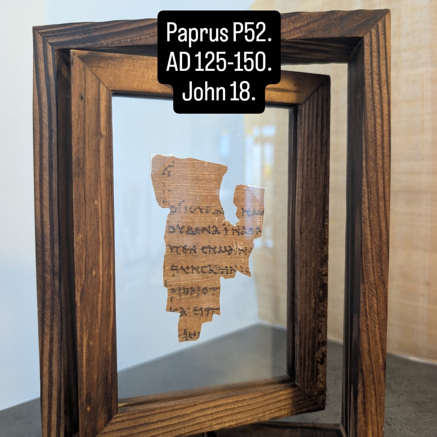 P52 Fragment Replica: Gospel of John 18:31-38. (walnut wood frame)